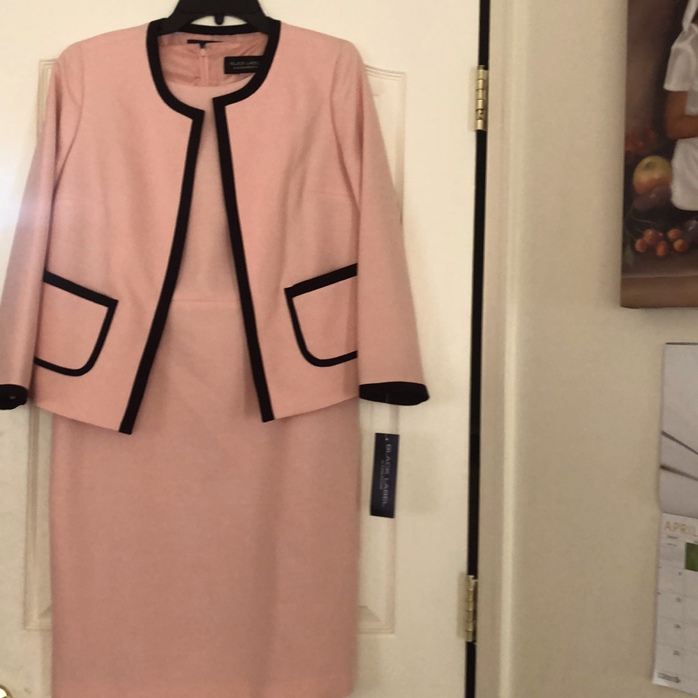 Two-piece lady's dress and jacket.